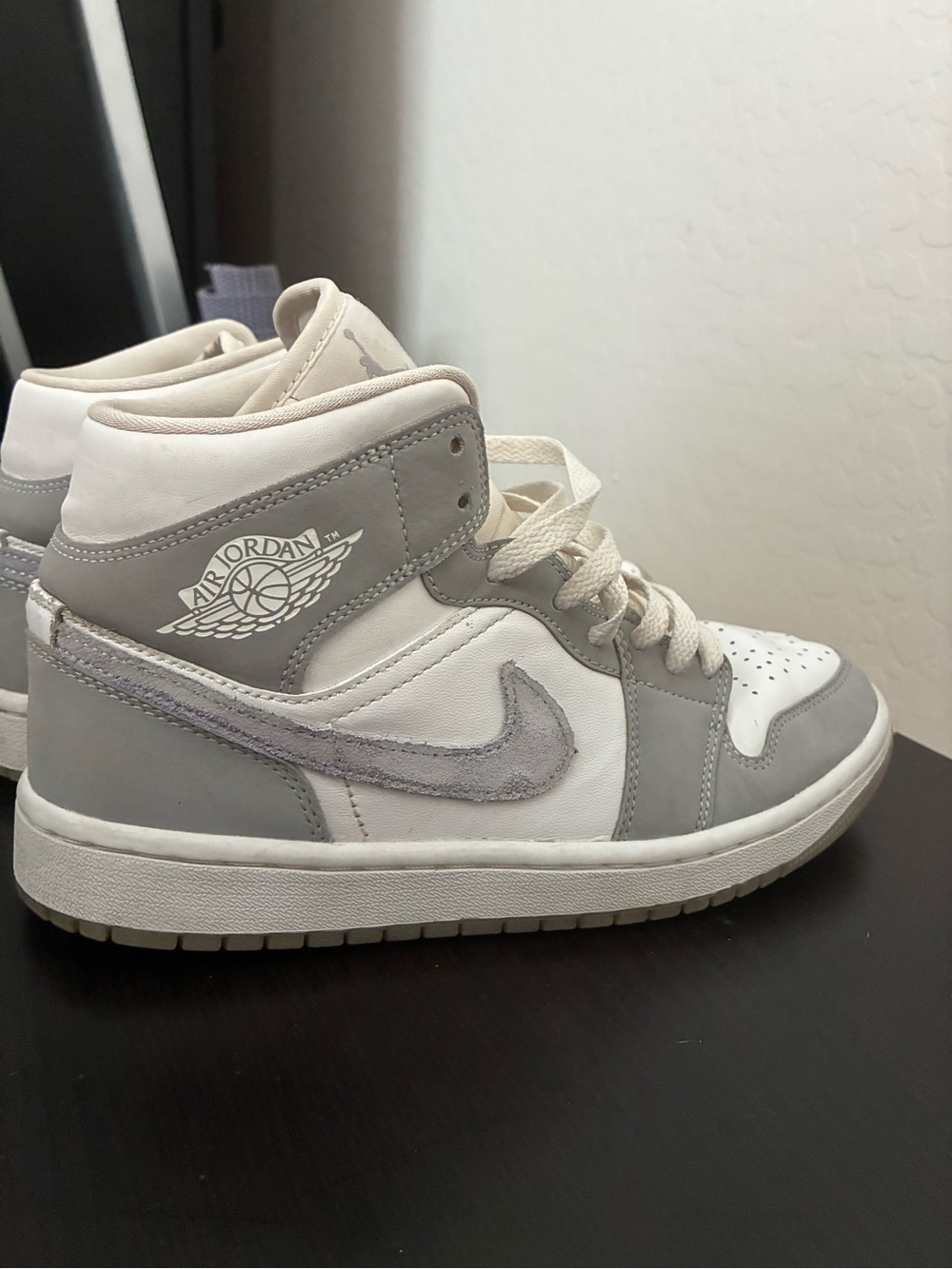 Jordan Women’s High-Top Sneakers in White and Light Gray